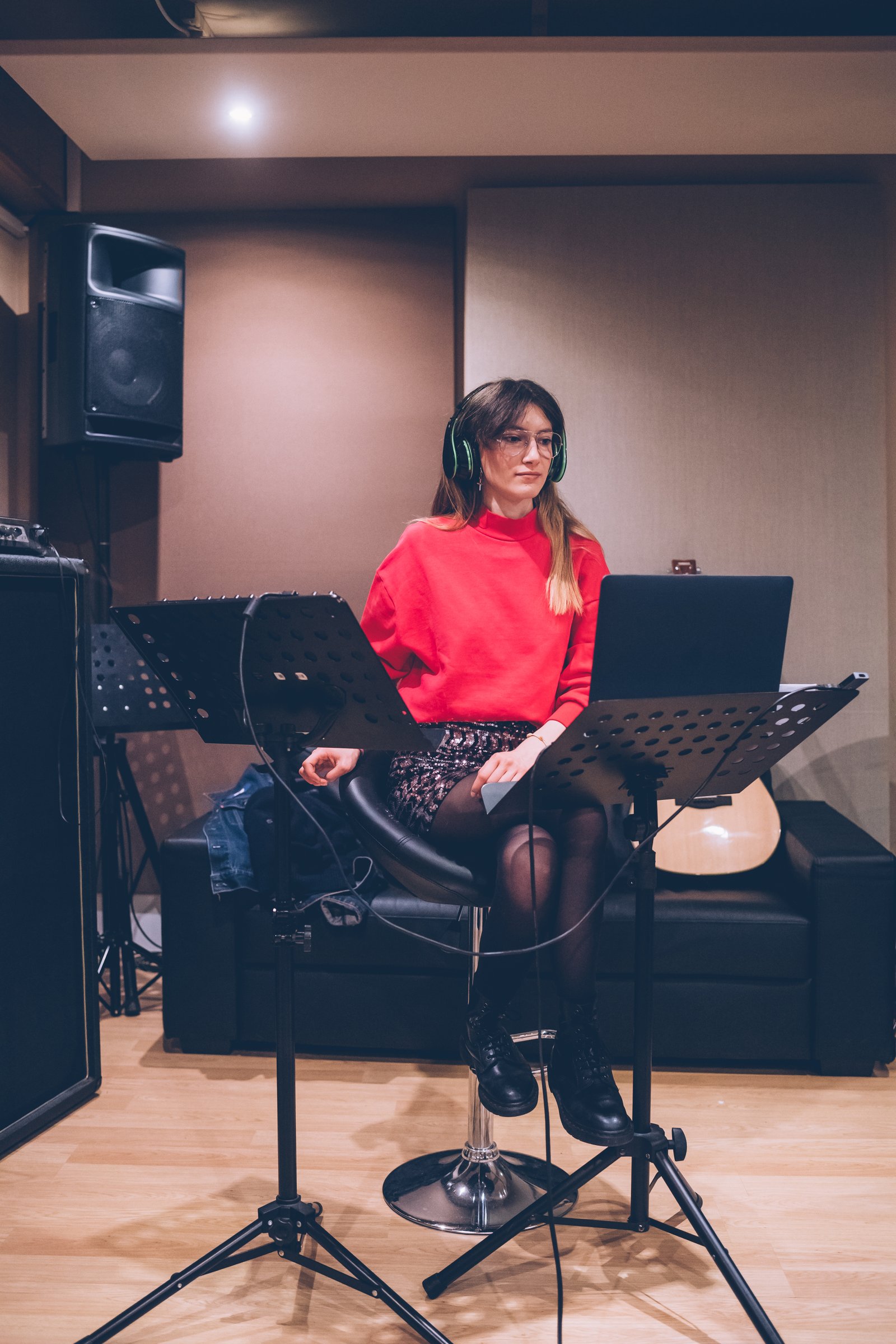 Independent musician working in a recording studio